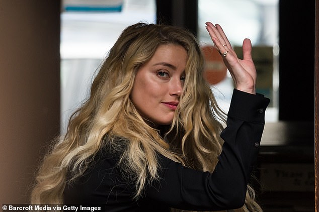 I stand with Amber Heard